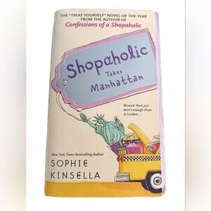 'Shopaholic Takes Manhattan' Coffee Table Book - Purple Cover